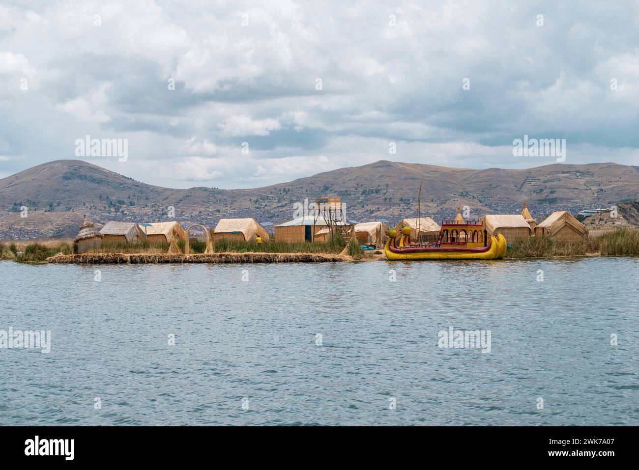 floating Uros Islands with traditional reed huts at lake Titicaca in ...