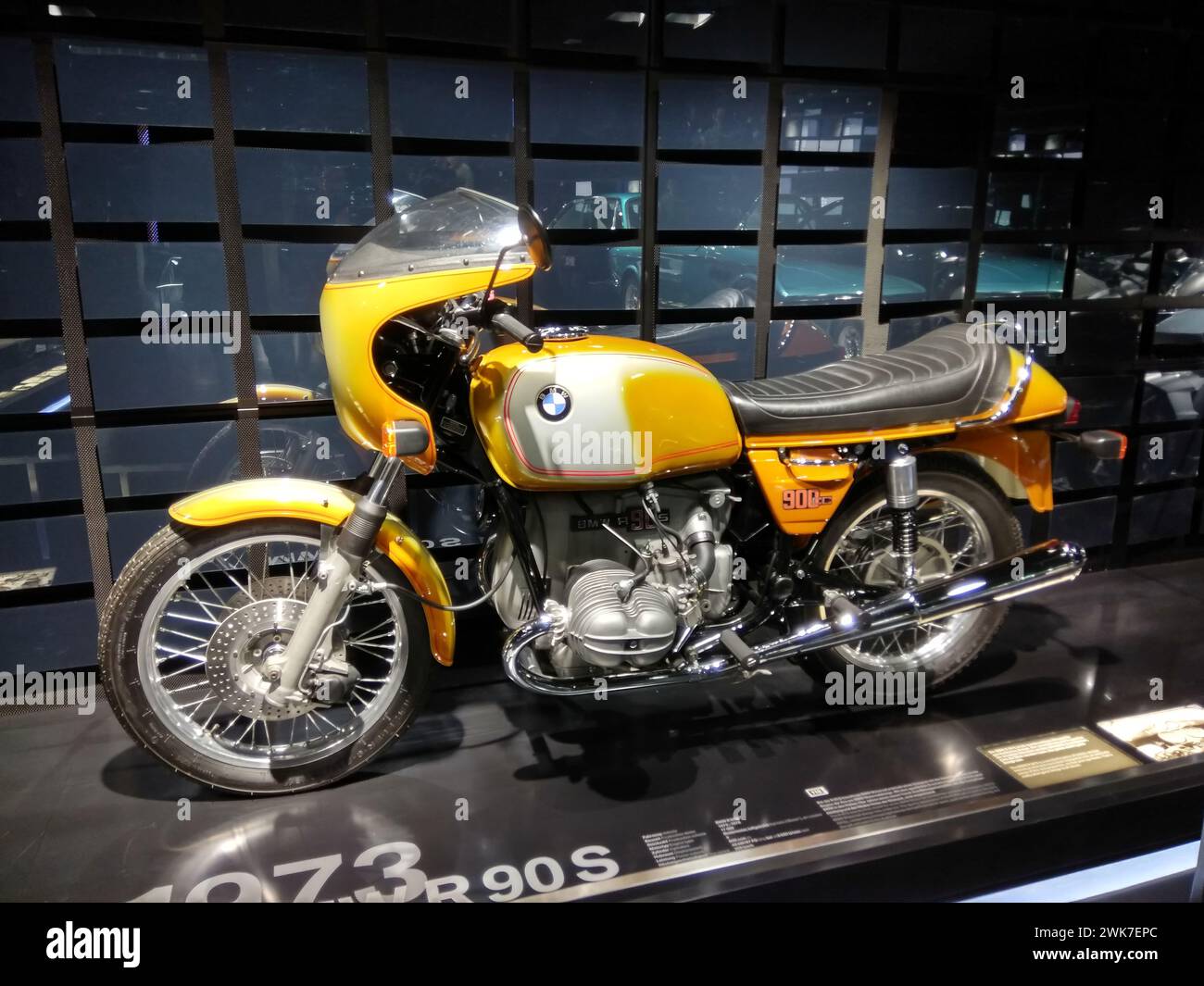 Bright yellow motorcycle with sleek silver stripes showcased Stock Photo