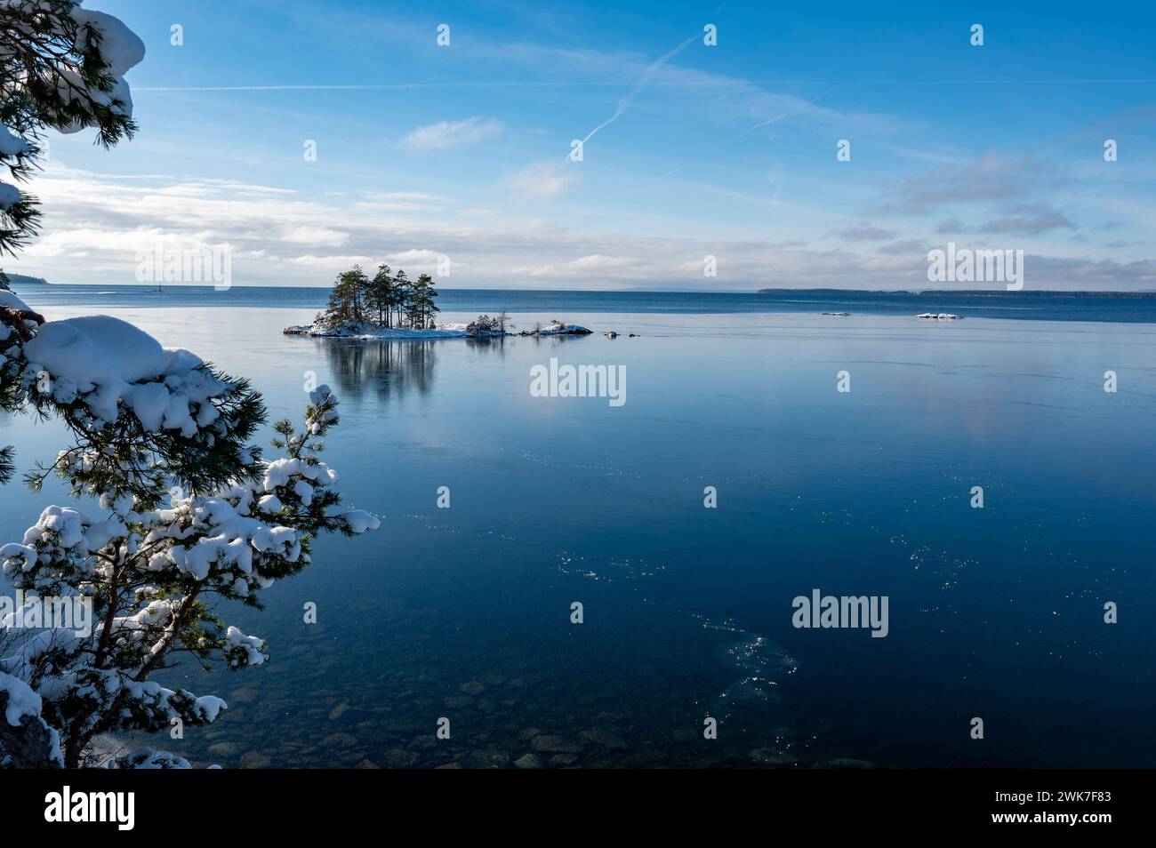 Beautiful view over ice and water on lake Stock Photo