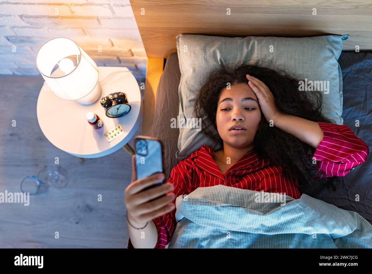Woman can't fall asleep, insomnia a sleep problems. Concept of sleep routine and techniques for better sleep for adults. Stock Photo
