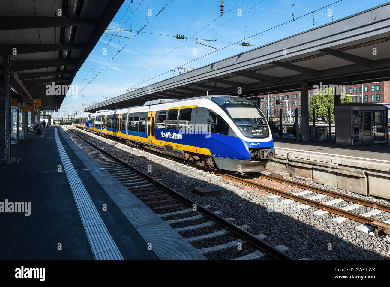 Essen, Germany - August 21, 2022: Deutsche NordWestBahn's high-speed train stopping at platform at the railway station in Essen, North Rhine-Westphali Stock Photo