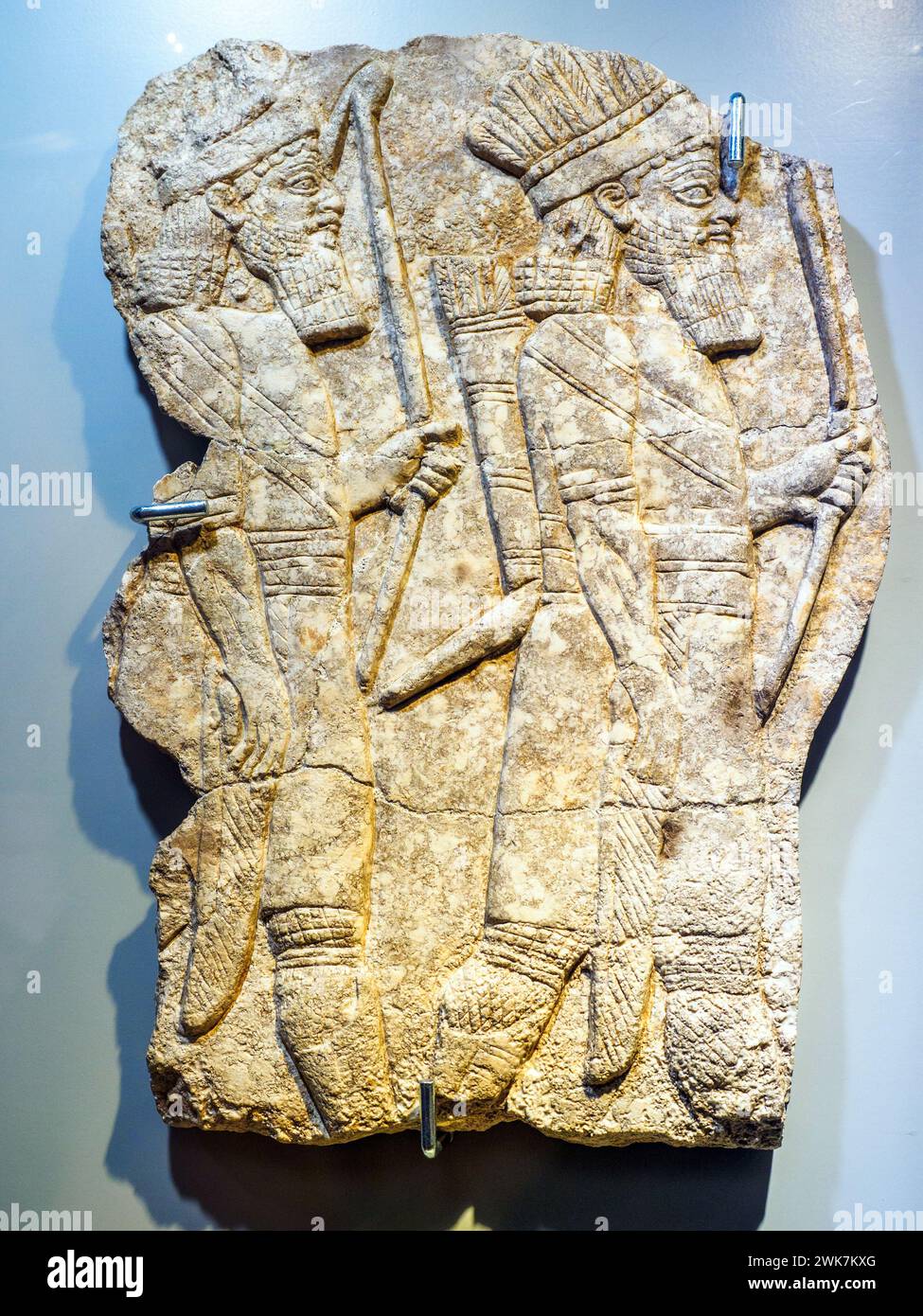 Elamite archers in gala uniform - Neo-Assiryan Empire, reign of Ashurbanipal (668 - 627 BC) - Limestone - Nineveh (Kuyunjik), North palace - Museo di Scultura Antica Giovanni Barracco, Rome, Italy Stock Photo