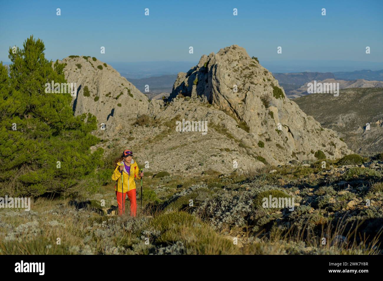 A woman hiking in the Costa Blanca mountains, Alicante, Spain - stock photo Stock Photo