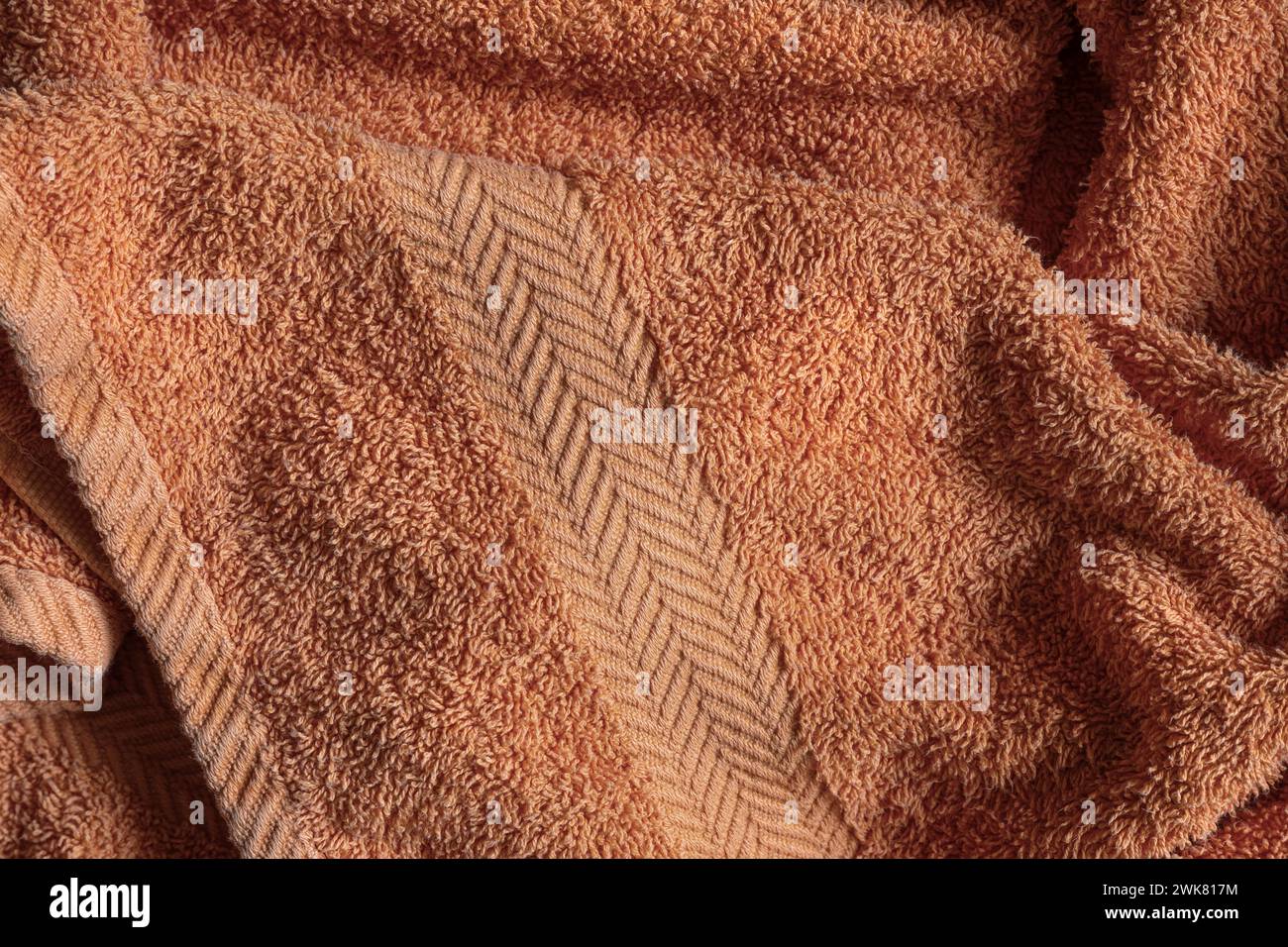 Peach fuzz bath towel pattern as background and texture Stock Photo