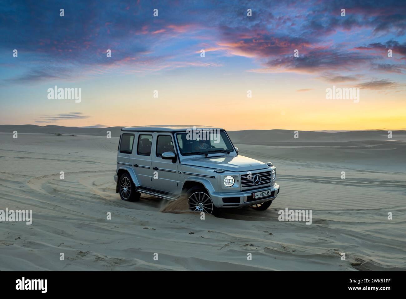 Mercedes G500 Silver Color Dune Bashing Stock Photo