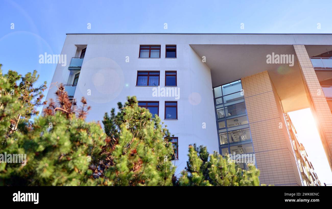 Eco city with modern exterior design of apartment building and ... - High-End Suburban Condos With Eco-Designed Landscaping