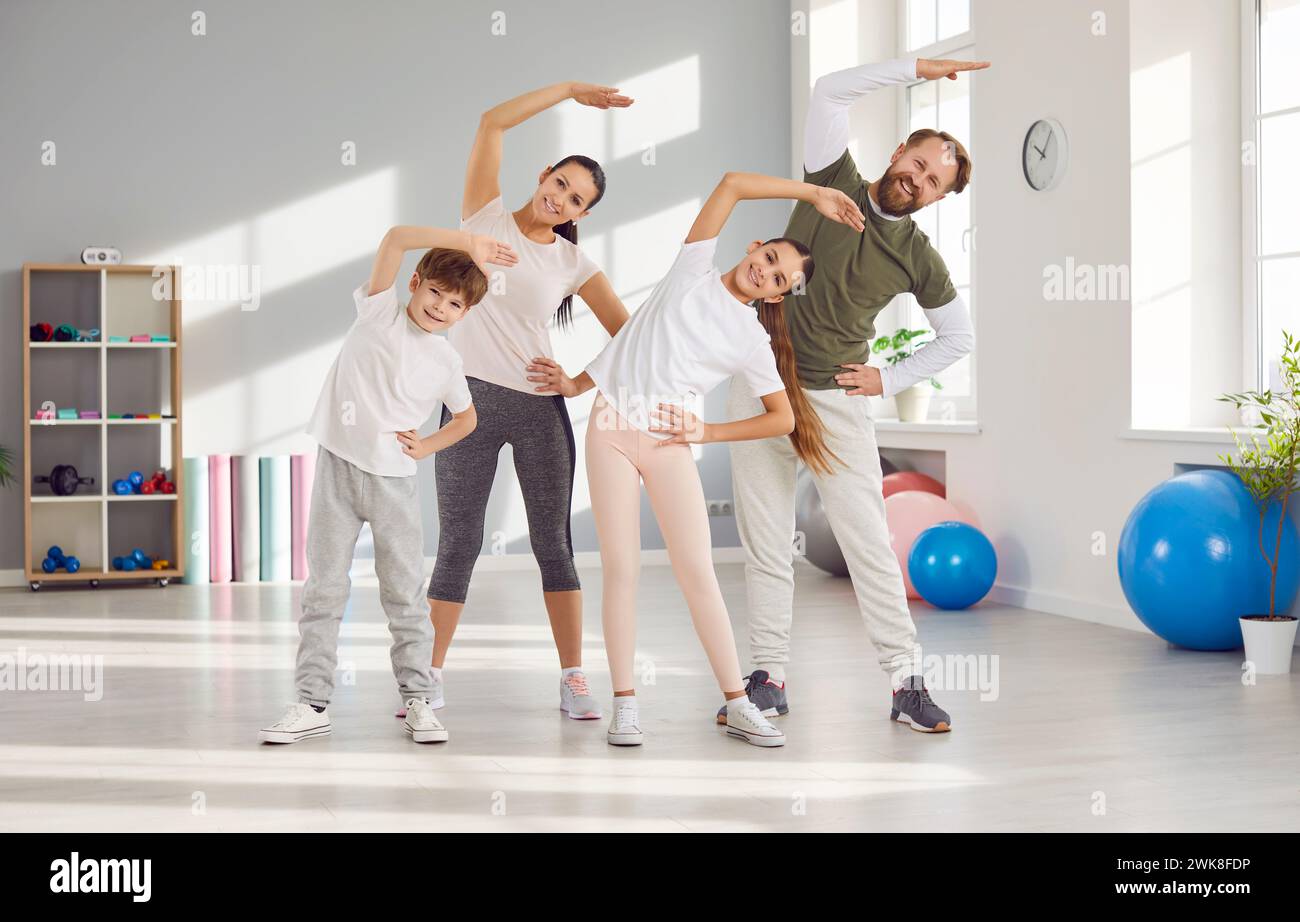 Happy sporty active family hi-res stock photography and images - Alamy