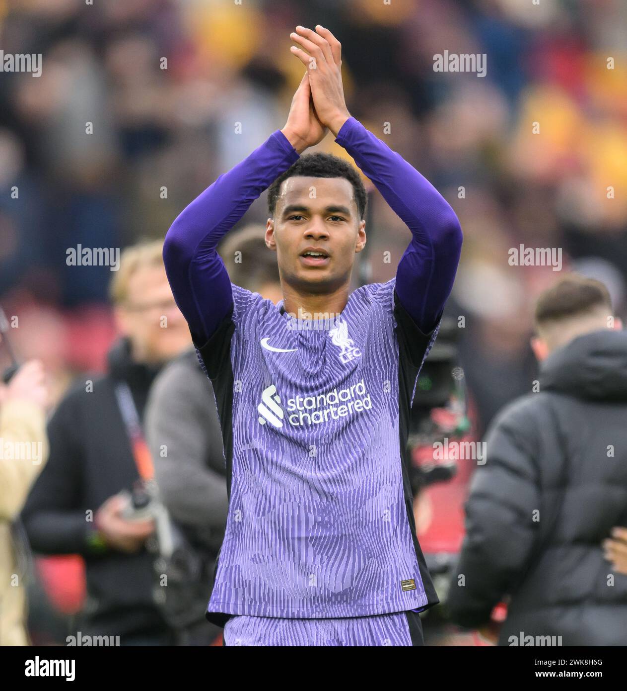 London, UK. 17th Feb, 2024 - Brentford v Liverpool - Premier League - GTech Community Stadium.                                                                 Cody Gakpo celebrates with the travelling Liverpool fans at the GTech Community Stadium.                                                                      Picture Credit: Mark Pain / Alamy Live News Stock Photo
