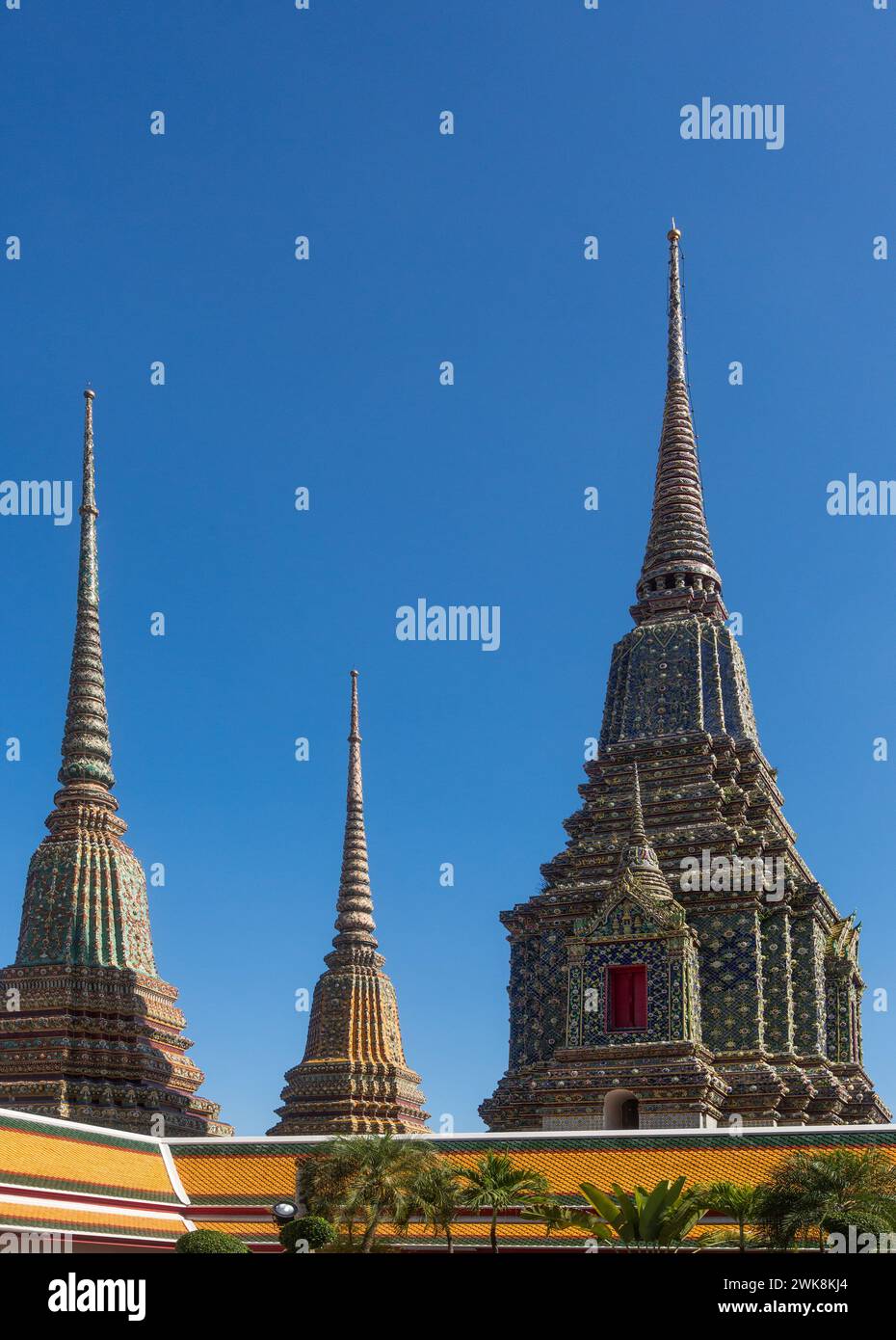 Spires of Phra Chedi Rai in the Wat Pho Buddhist temple complex in Bangkok, Thailand.  They monuments built by King Rama III to hold the ashes of the Stock Photo