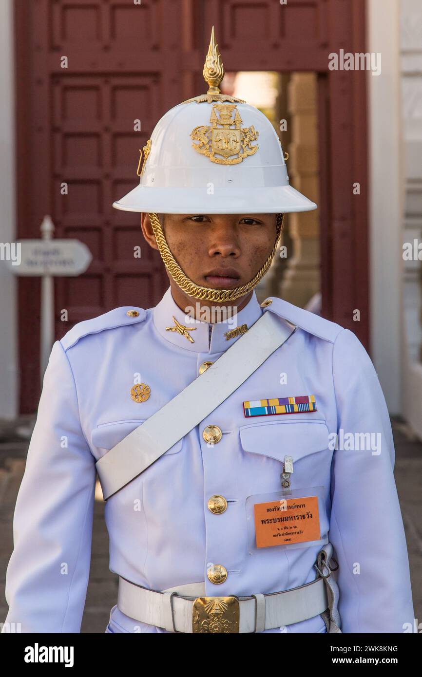 A Thai soldier in ceremonial uniform on duty at the Grand Palace ...