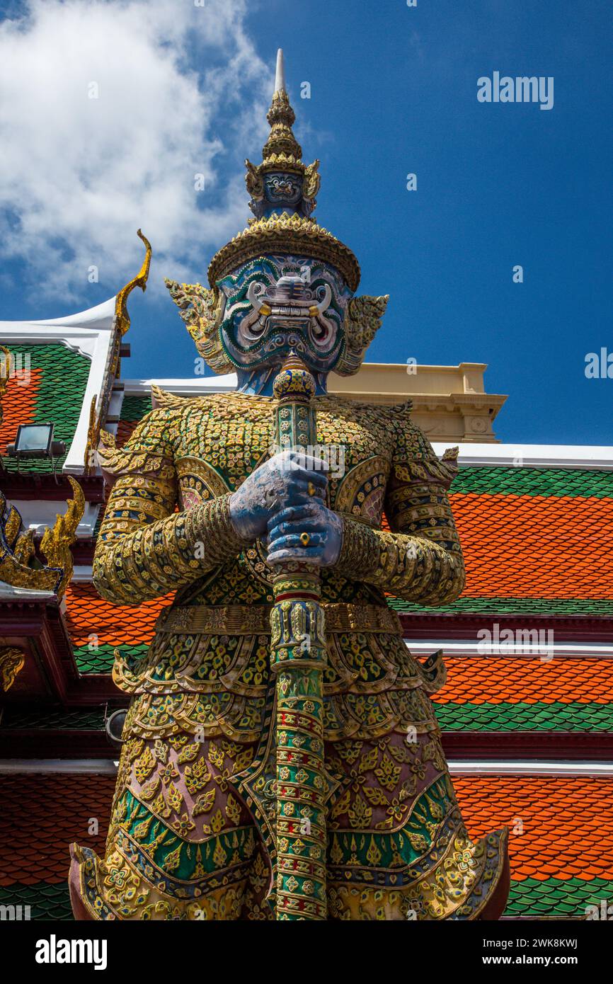 A yaksha guardian statue at the Temple of the Emerald Buddha complex in