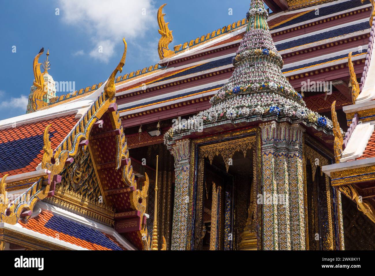 Ornately-decorated buildings around the Temple of the Emerald Buddha at the Grand Palace complex in Bangkok, Thailand. Stock Photo