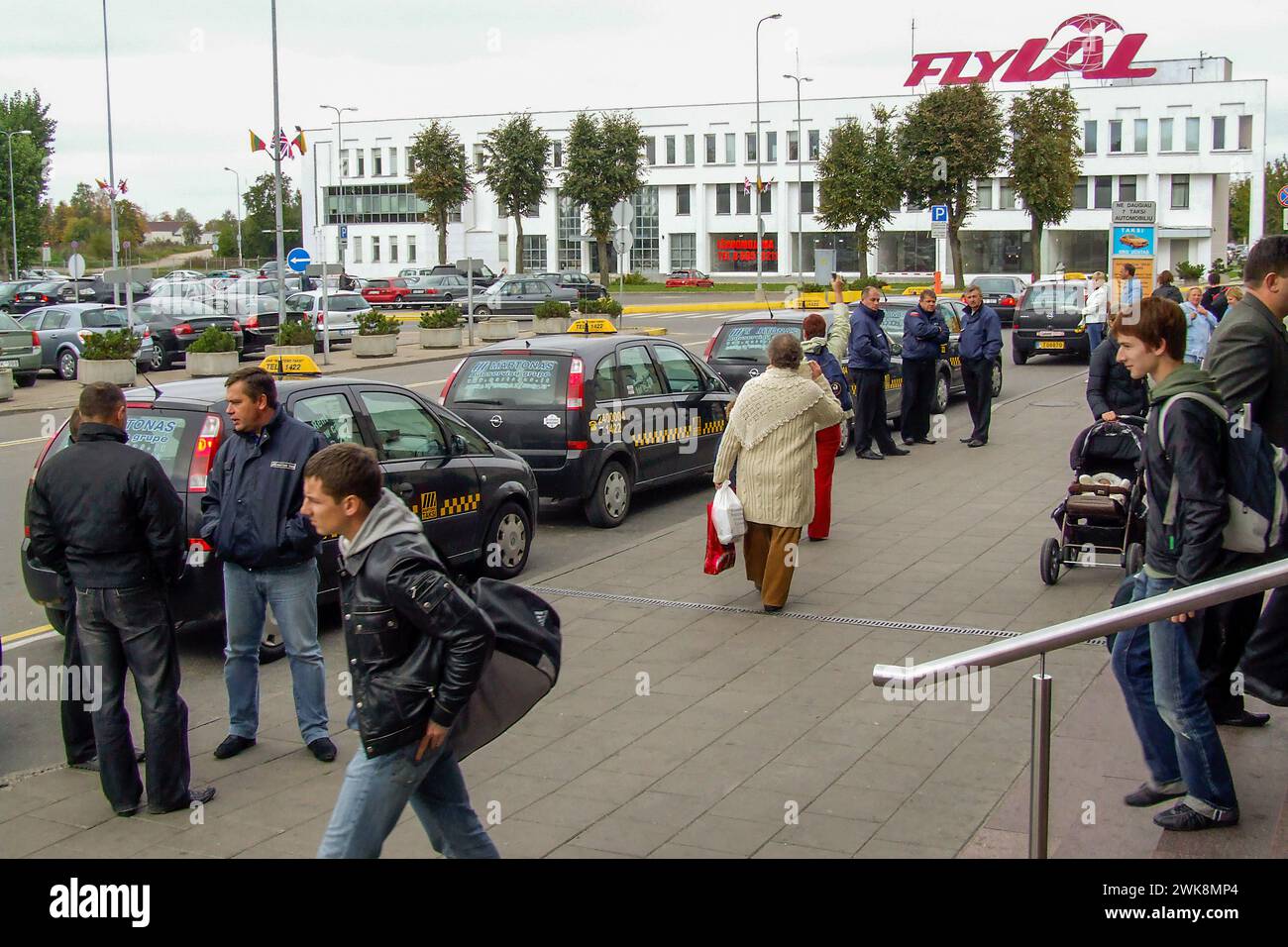 Taxis wait in front of the Vilnius International Airport in Lithuania. Stock Photo