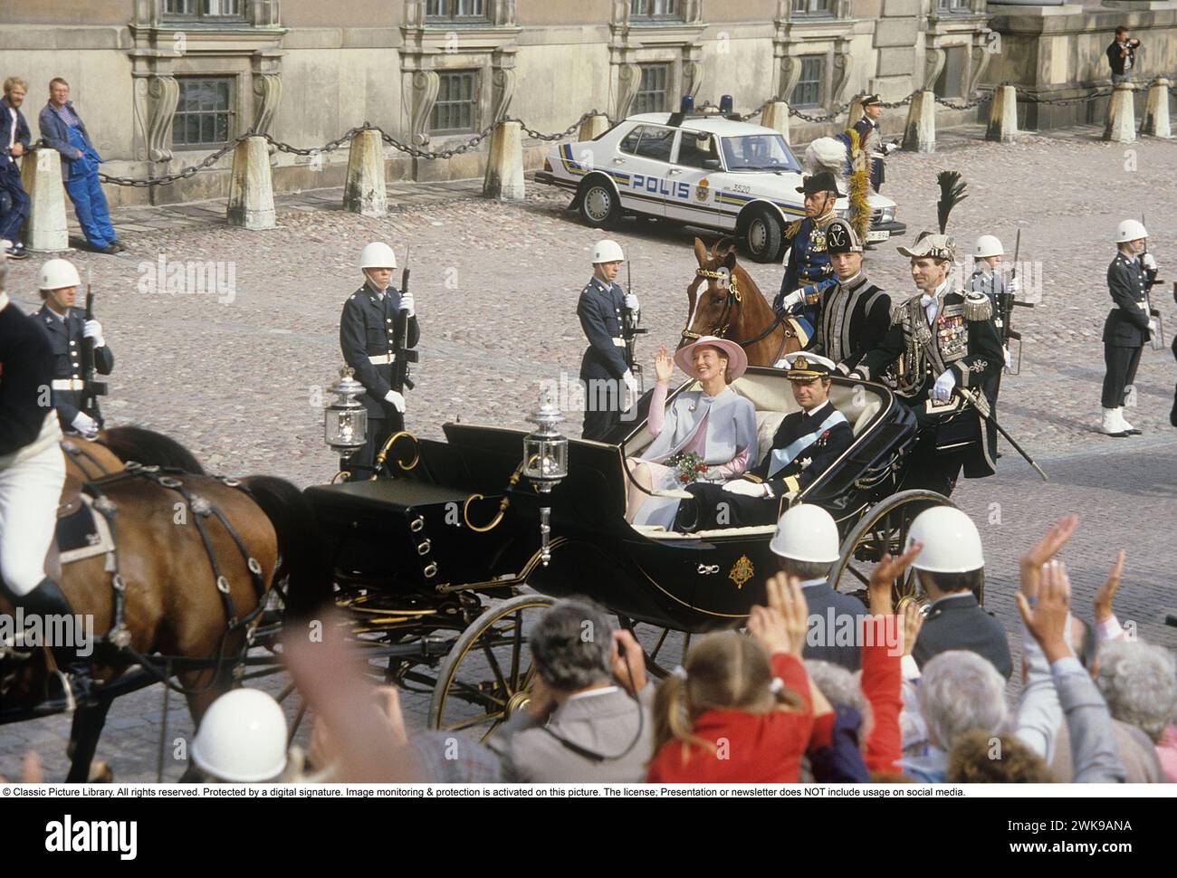 Carl XVI Gustaf, King of Sweden. Born 30 april 1946.  Pictured with Queen Margrethe of Denmark 1985 in an open horsedrawn carriage outside the royal castle in Stockholm Sweden. The two royals are cousins. *** Local Caption *** © Classic Picture Library. All rights reserved. Protected by a digital signature. Image monitoring & protection is activated on this picture. The license; Presentation or newsletter does NOT include usage on social media. Stock Photo