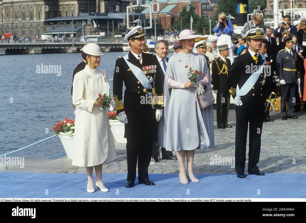 Carl XVI Gustaf, King of Sweden. Born 30 april 1946.  Pictured with Queen Silvia, Queen Margrethe of Denmark and prince Henrik 1985 in Stockholm. *** Local Caption *** © Classic Picture Library. All rights reserved. Protected by a digital signature. Image monitoring & protection is activated on this picture. The license; Presentation or newsletter does NOT include usage on social media. Stock Photo