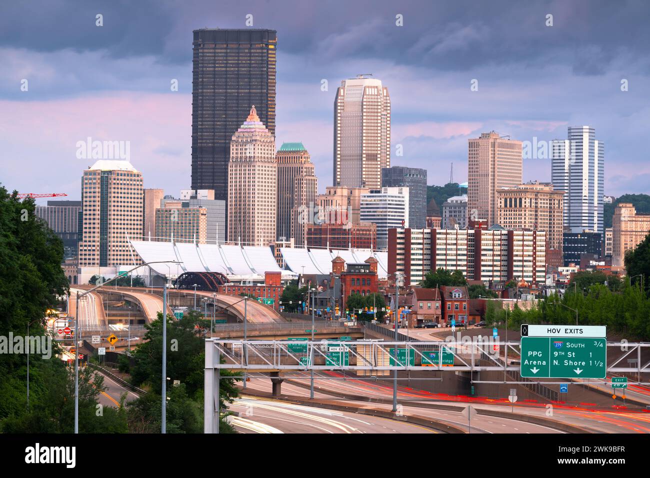 Pittsburgh, Pennsylvania, USA downtown city skyline over looking highways at dusk. Stock Photo