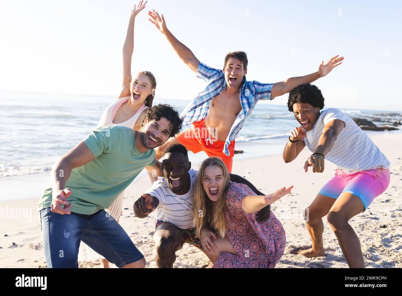 Diverse group of friends enjoying a day at the beach Stock Photo - Alamy