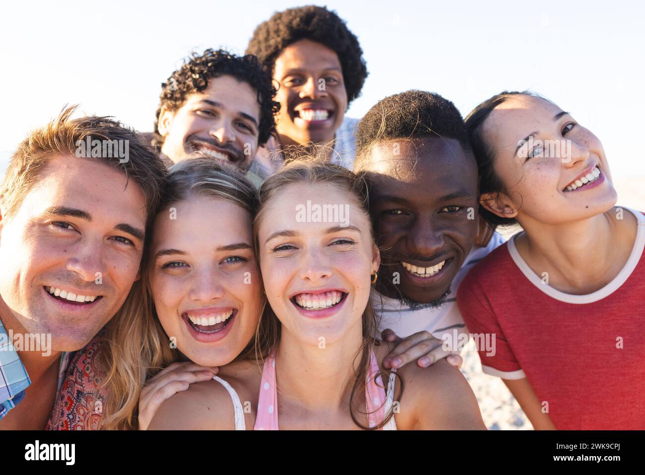 Diverse group of friends enjoying a day at the beach Stock Photo - Alamy