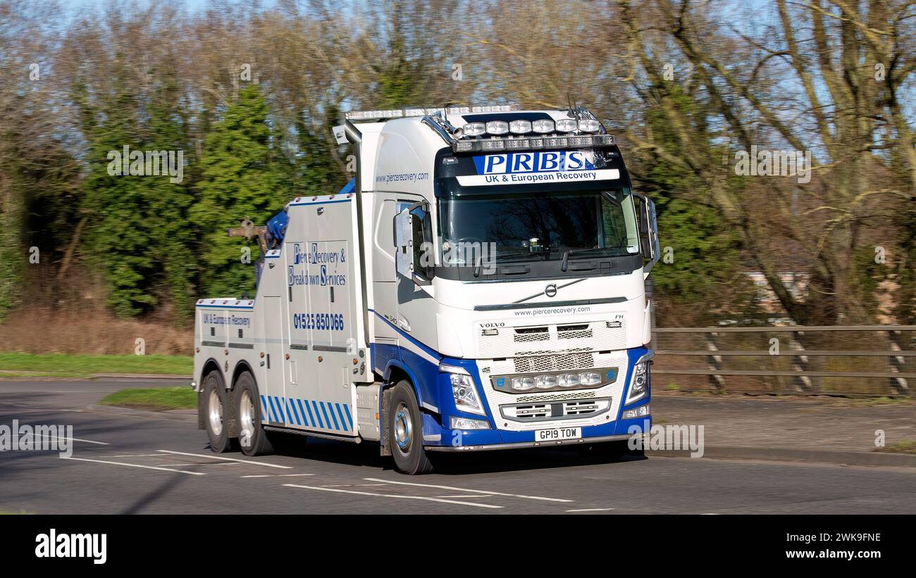 Milton Keynes,UK-Feb 12th 2024: Volvo commercial vehicle recovery and breakdown truck driving on an English road Stock Photo