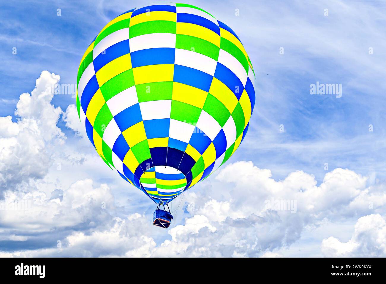 Colorful hot air balloon flying over blue sky with white cloud Stock ...