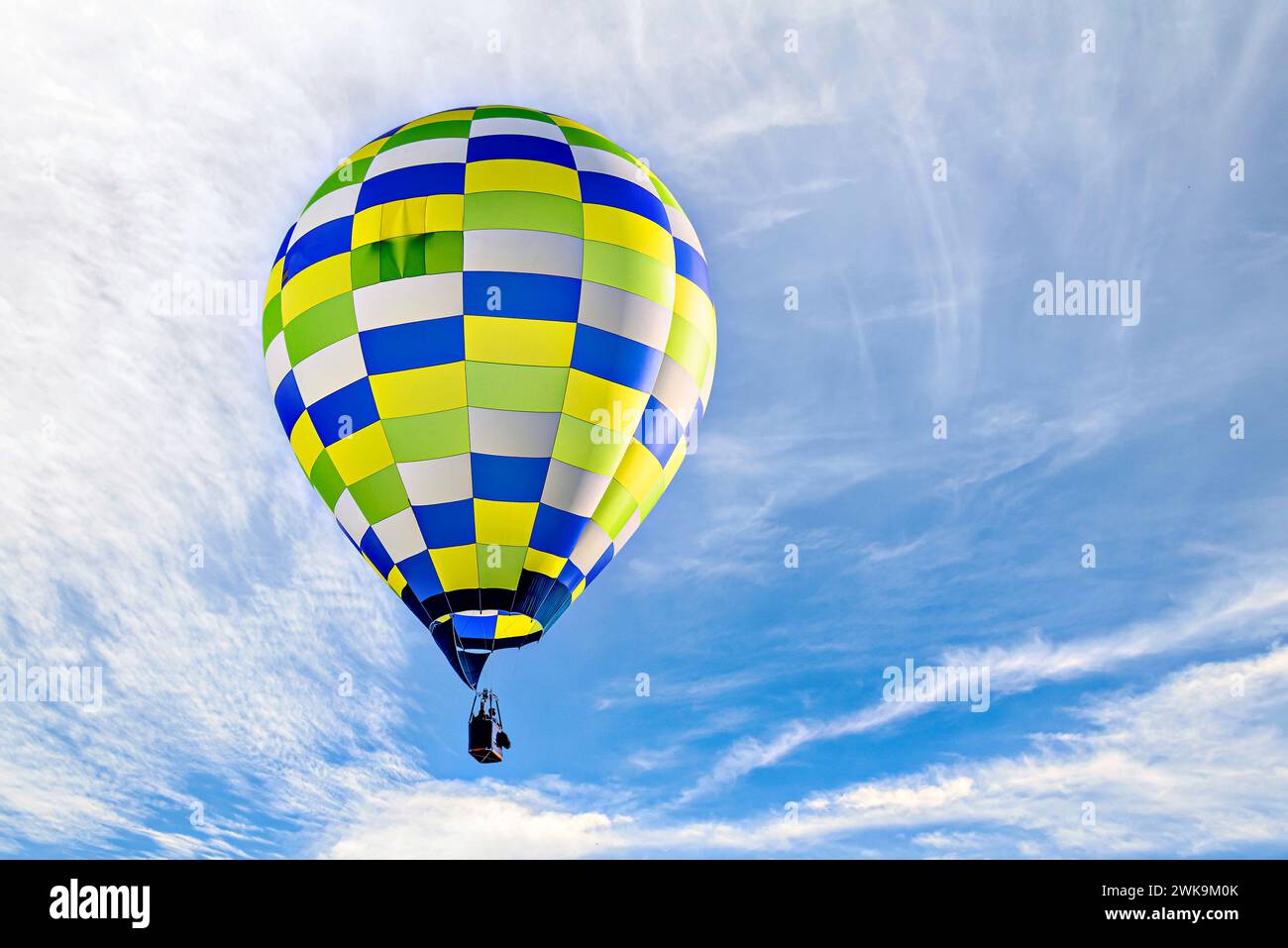 Colorful hot air balloon flying over blue sky with white cloud Stock ...