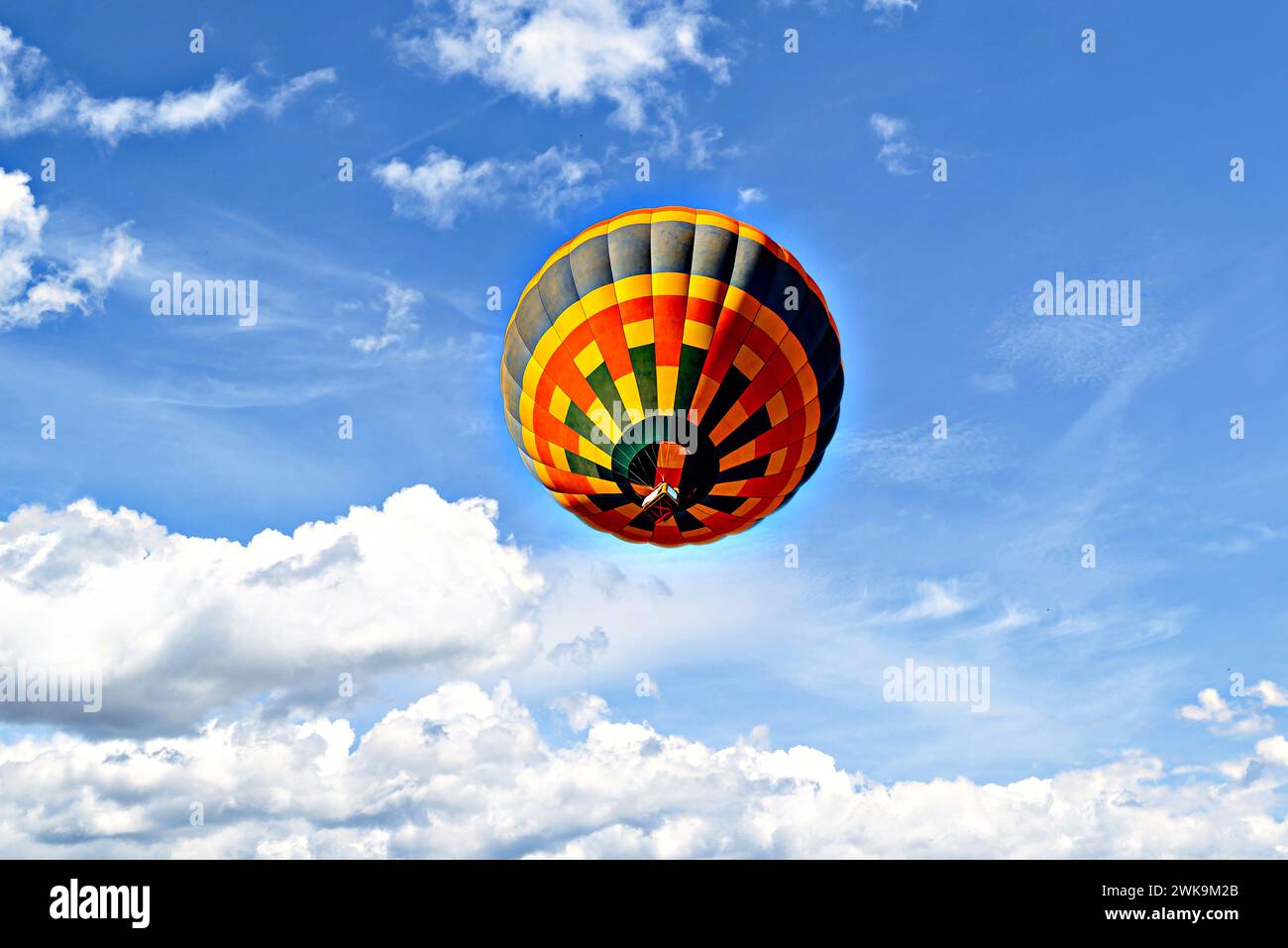 Colorful hot air balloon flying over blue sky with white cloud Stock ...