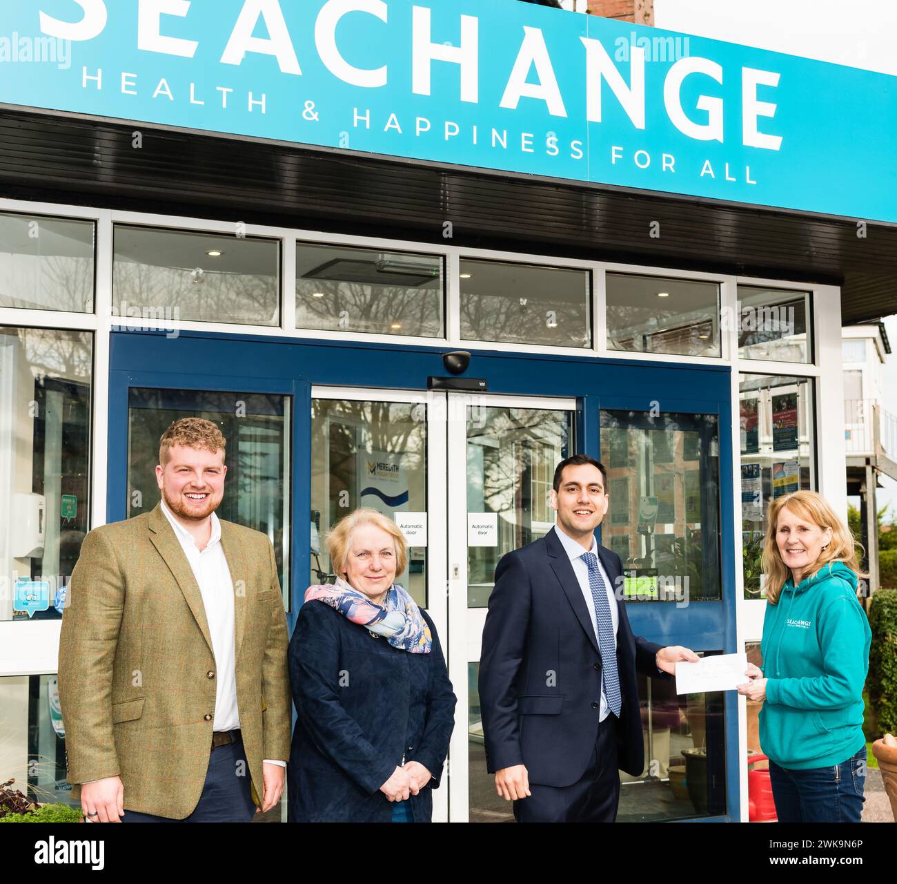 David Reed, a prospective MP, presenting a chegue to the Seachange charity of Budleigh.Salterton. Stock Photo