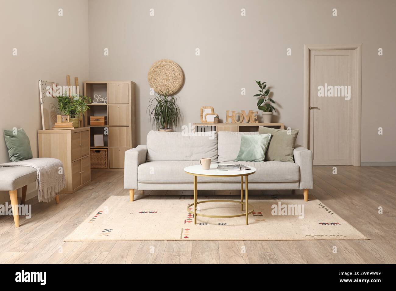 Interior of modern living room with grey sofa and coffee table Stock