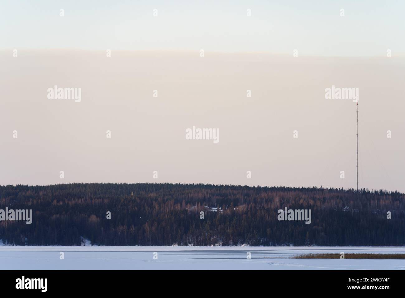 Frozen Lake Landscape With A Tall Radio Tower In The Distance Lahti frozen-lake-landscape-with-a-tall-radio-tower-in-the-distance-lahti