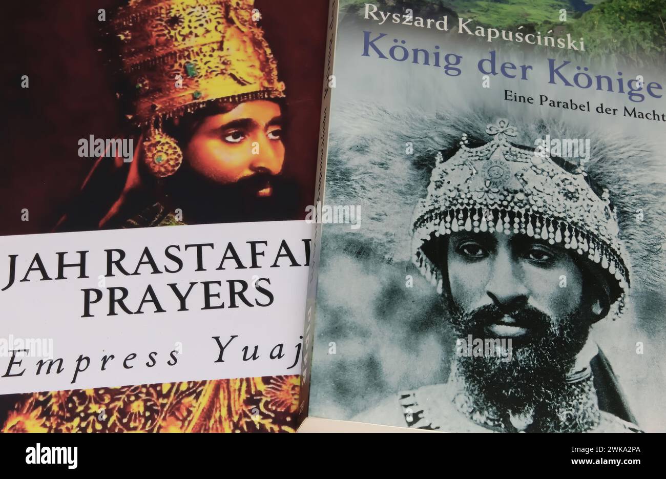 Viersen, Germany - January 9. 2024: Closeup book covers about ethiopian Emperor Haile Selassie and his Jah Rastafari prayers Stock Photo