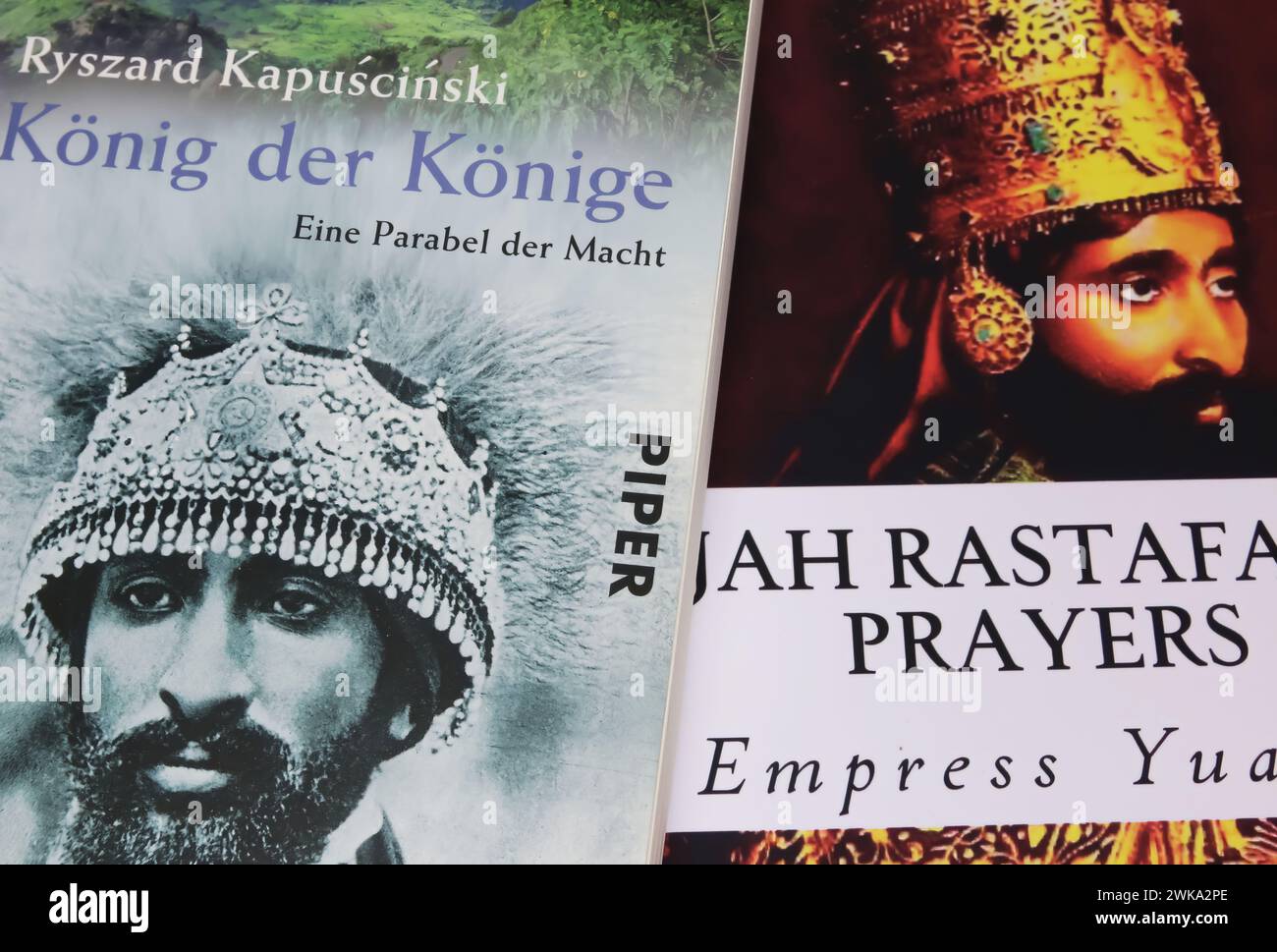 Viersen, Germany - January 9. 2024: Closeup book covers about ethiopian Emperor Haile Selassie and his Jah Rastafari prayers Stock Photo