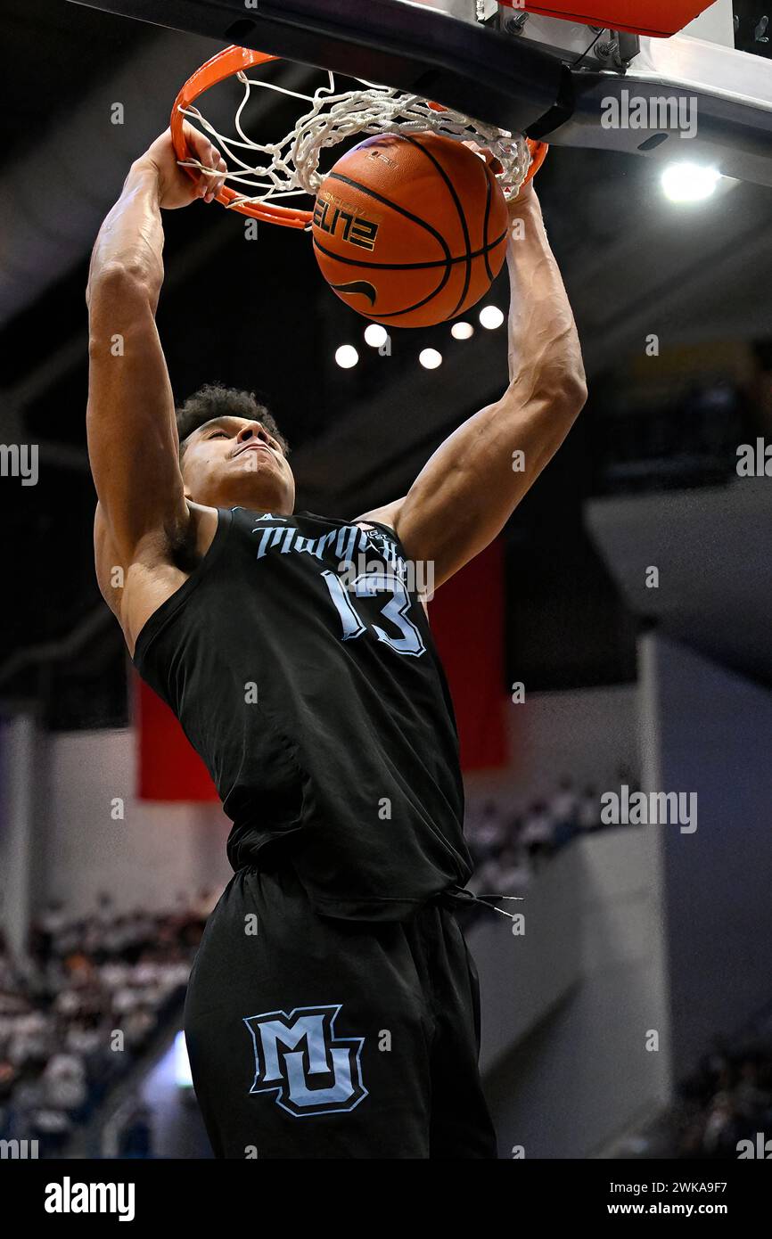 Marquette forward Oso Ighodaro (13) dunks in the second half of an NCAA ...