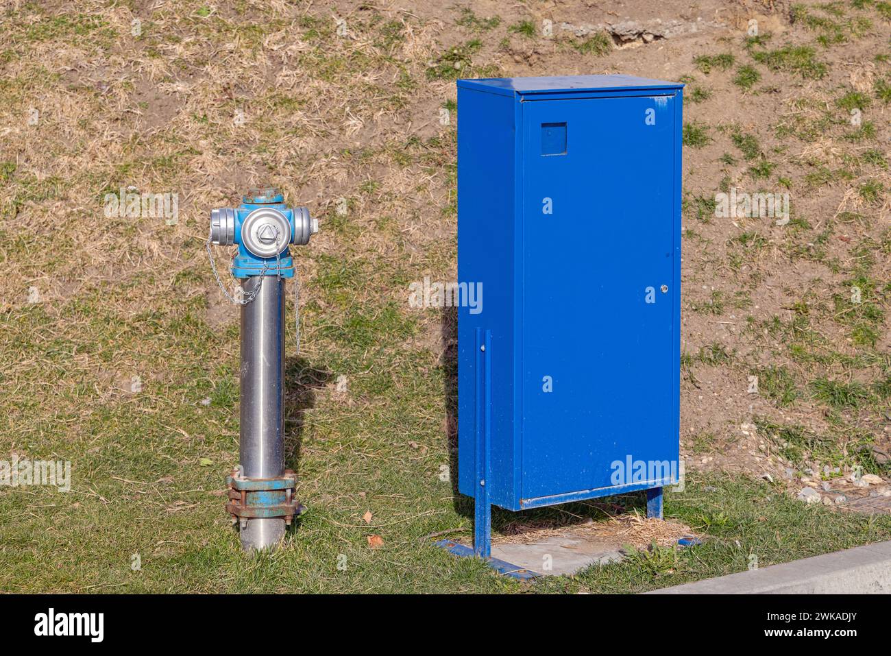 Firefighters Equipment Blue Box and Water Hydrant Pipe Stock Photo