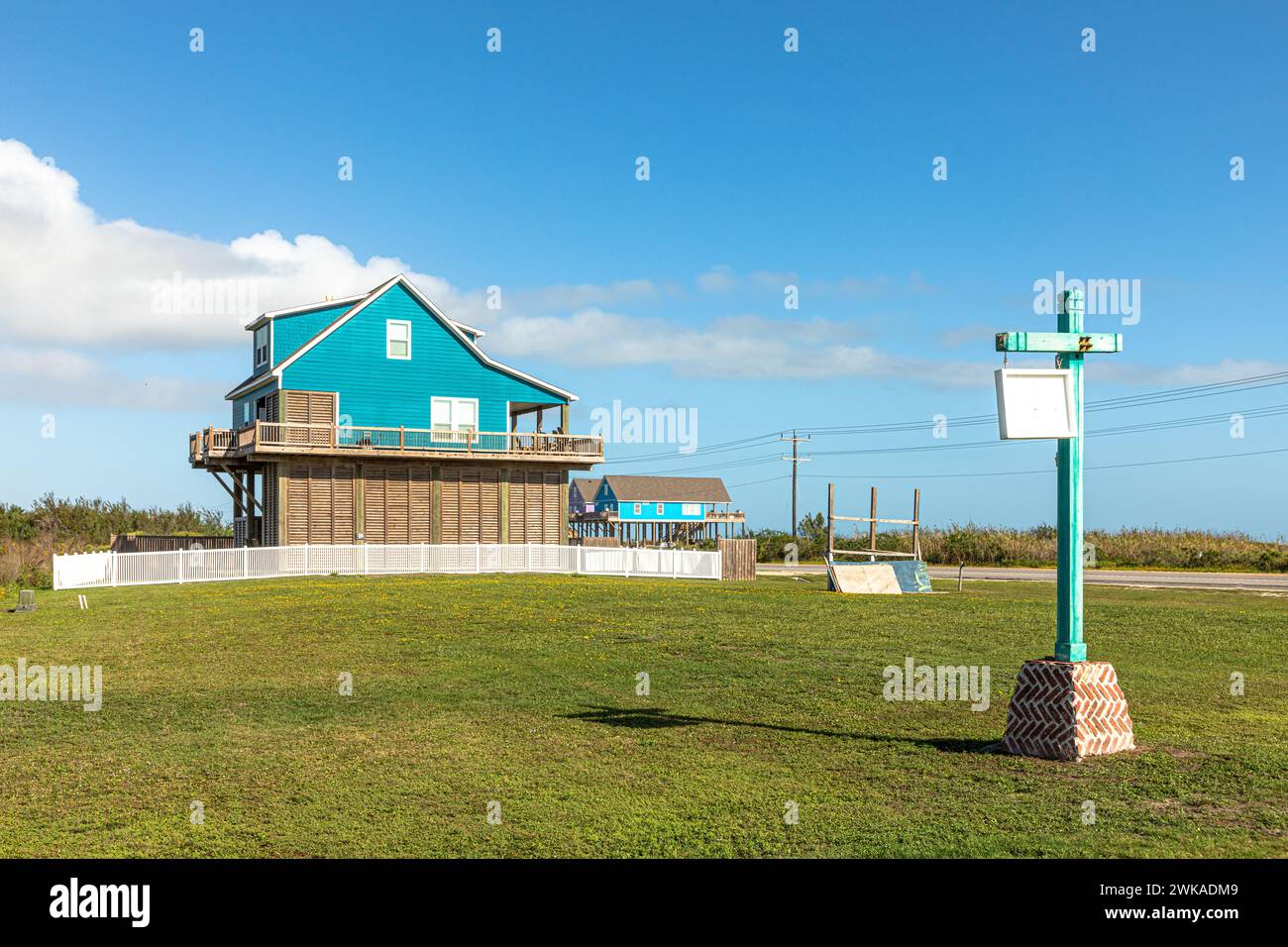 new beach houses at Port Bolivar on wooden stilts to protect against flooding, Texas, USA Stock