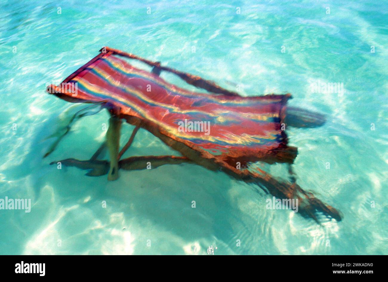 wooden chair at the beach with ocean view Stock Photo