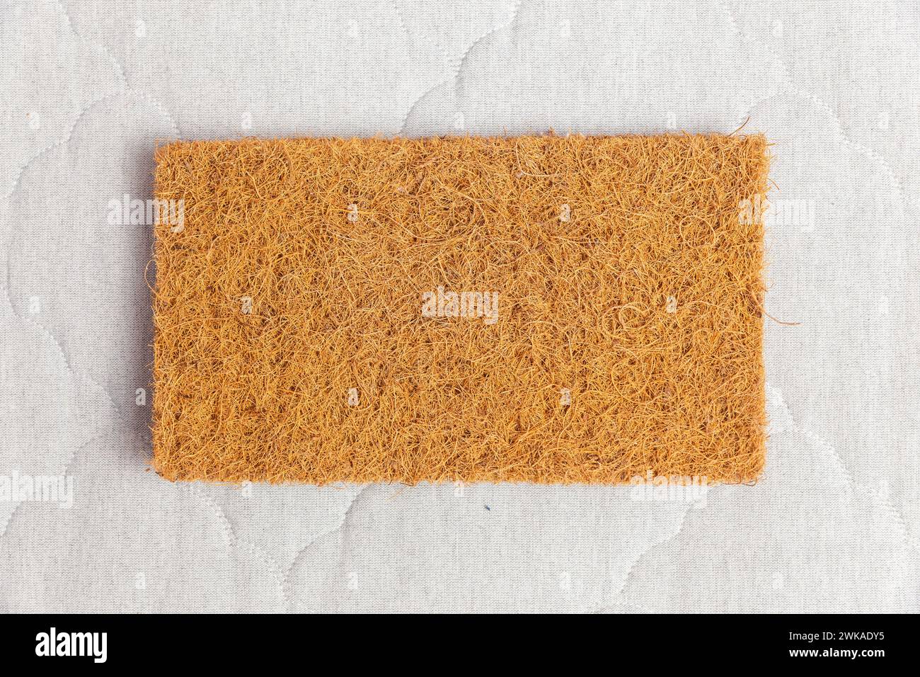 A rectangular sample of coconut coir used in the production of modern ...