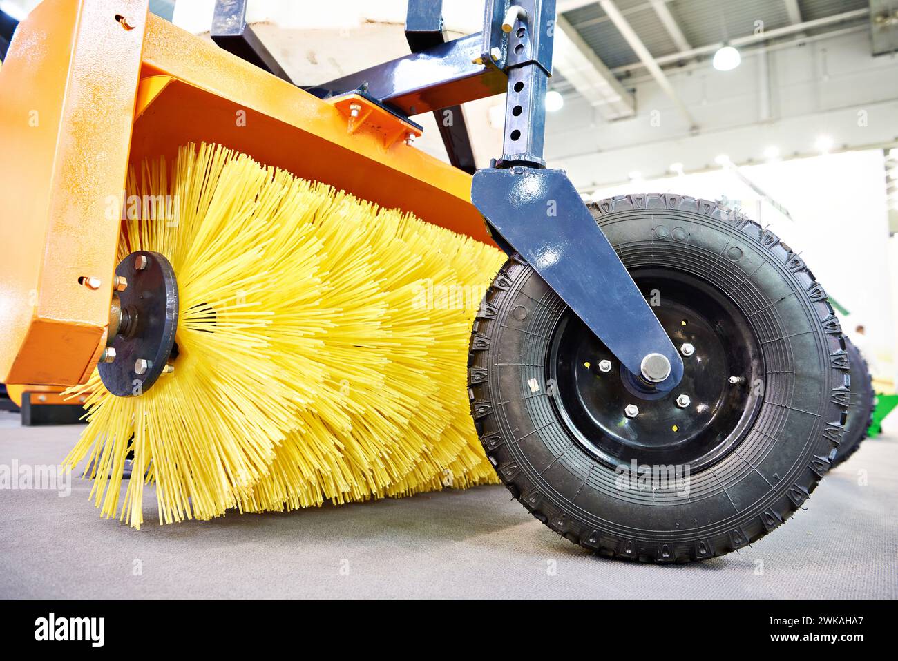 Mounted road utility brush for mechanical street sweeper Stock Photo