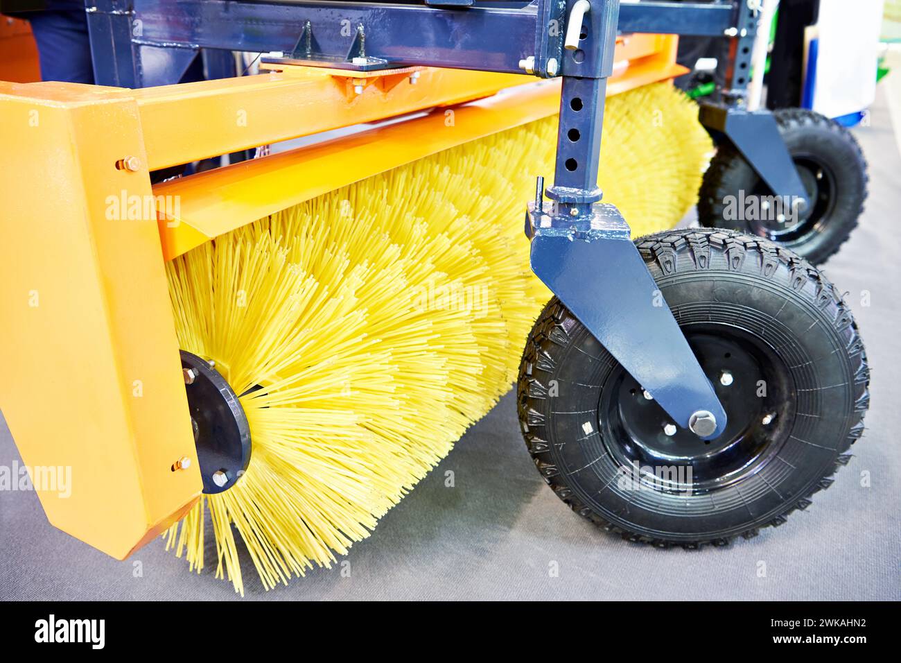 Mounted road utility brush for mechanical street sweeper Stock Photo