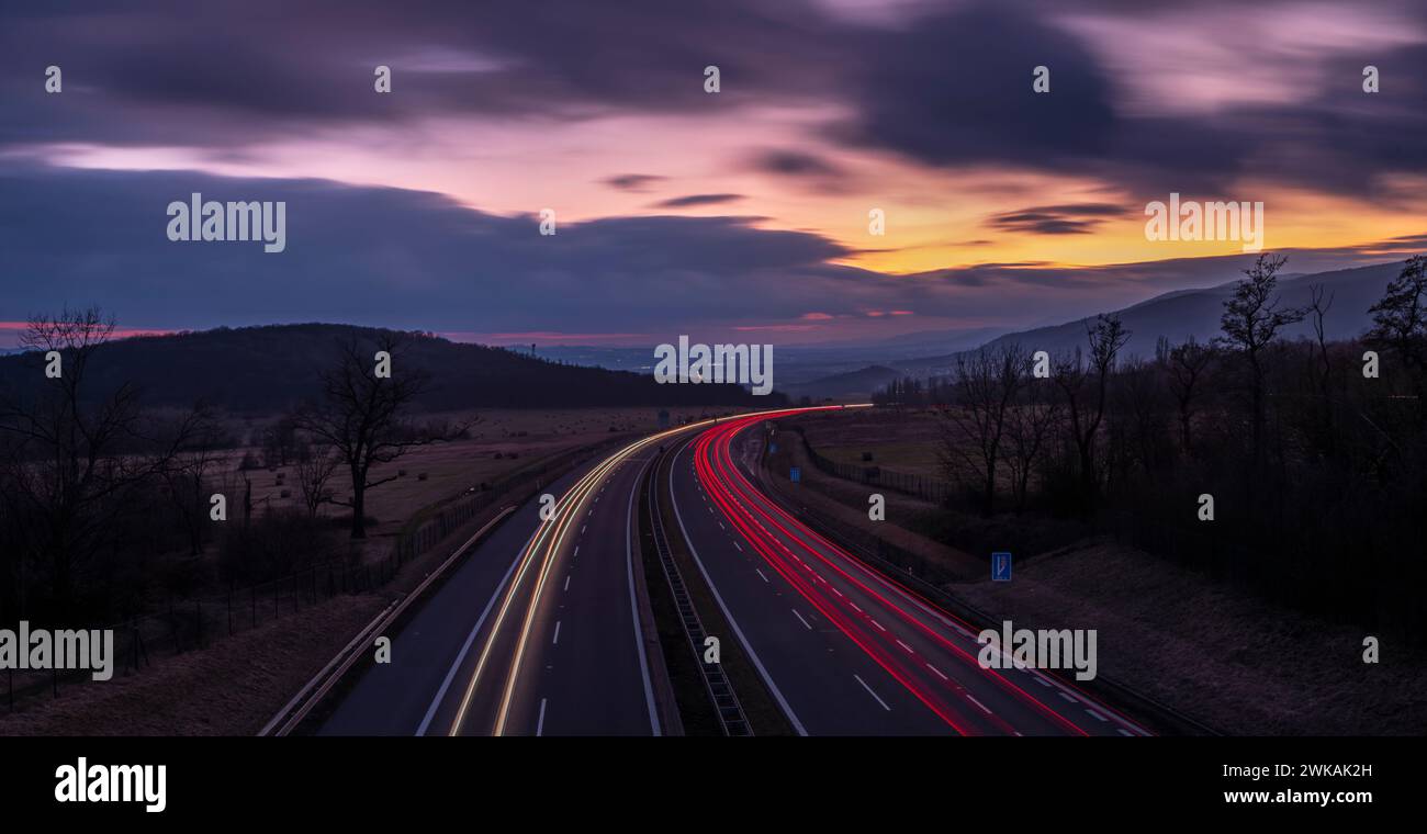 Highway near Krusne mountains with night color lines from cars Stock Photo