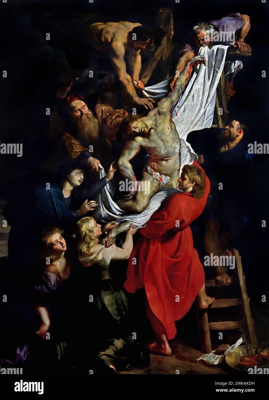 The Descent from the Cross; the central panel of a triptych painting by Peter Paul Rubens (1577 - 1640) 1611-1614 The Cathedral of Our Lady - Onze-Lieve-Vrouwekathedraal, ) Antwerp, Belgium, Belgian . ( 1352 construction ended in 1521) Gothic . ( The tragic moment when Jesus is taken from the cross and carried by a crowd of followers. ) Stock Photo