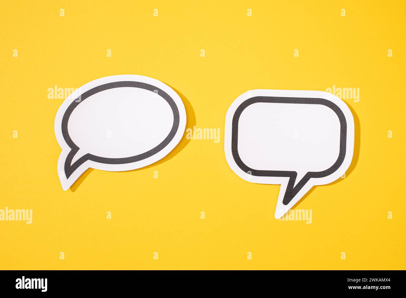 Two Blank Speech Bubble isolated on yellow background. Mock up template ...