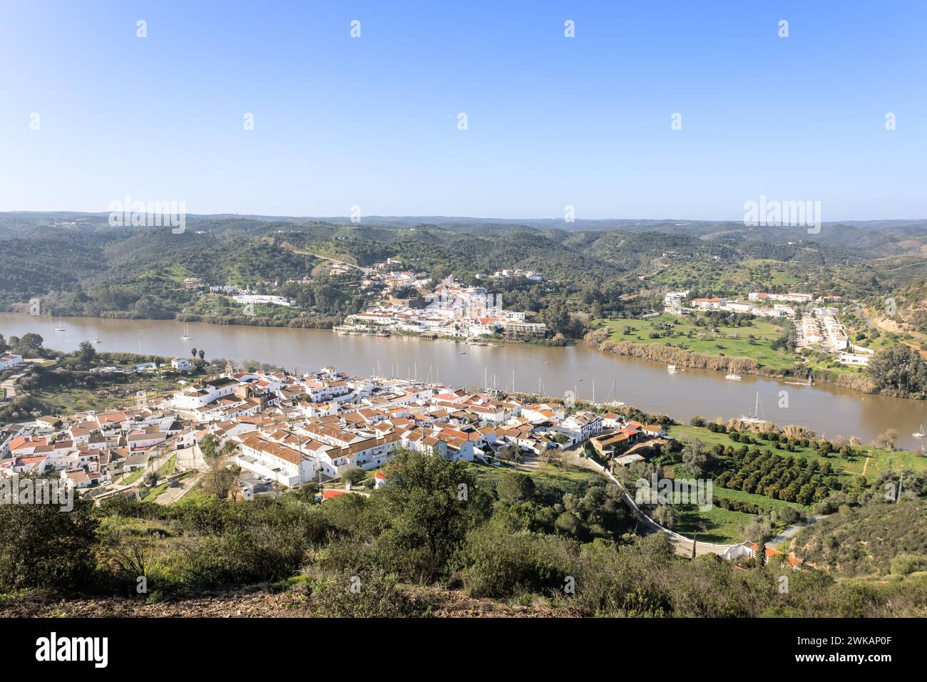 Aerial drone view of Sanlucar de Guadiana village in Huelva, Andalusia, on the banks of Guadiana river, in the border of spain with portugal, in front Stock Photo