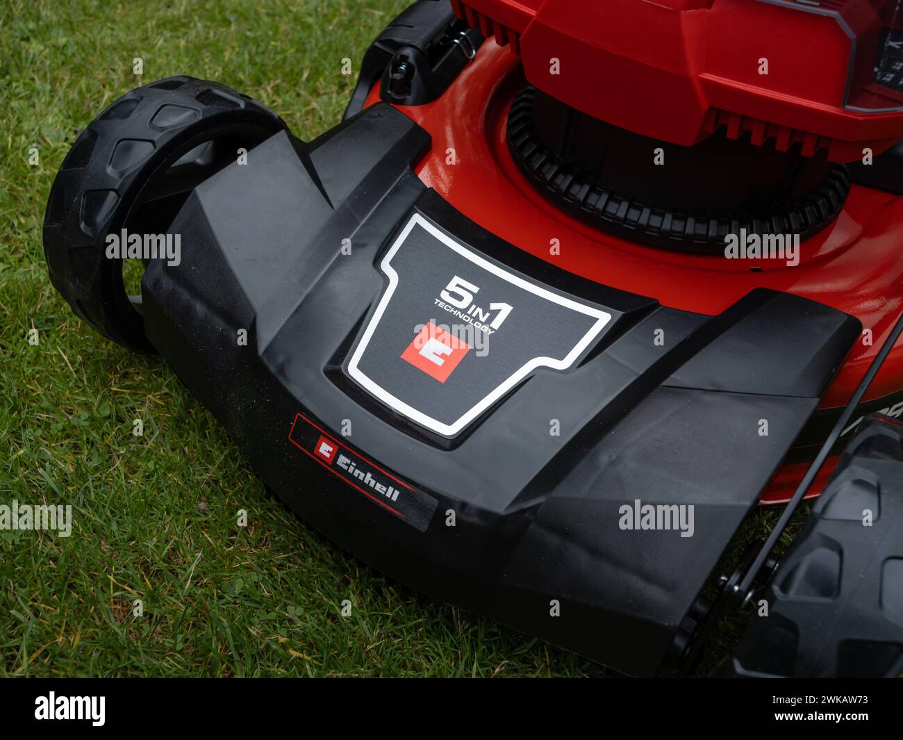 Einhell cordless lawn mower GP-CM 36 47 S HW Li. Close up of the front with the logo and the label 5 in 1 Technology. Red battery powered tool. Stock Photo