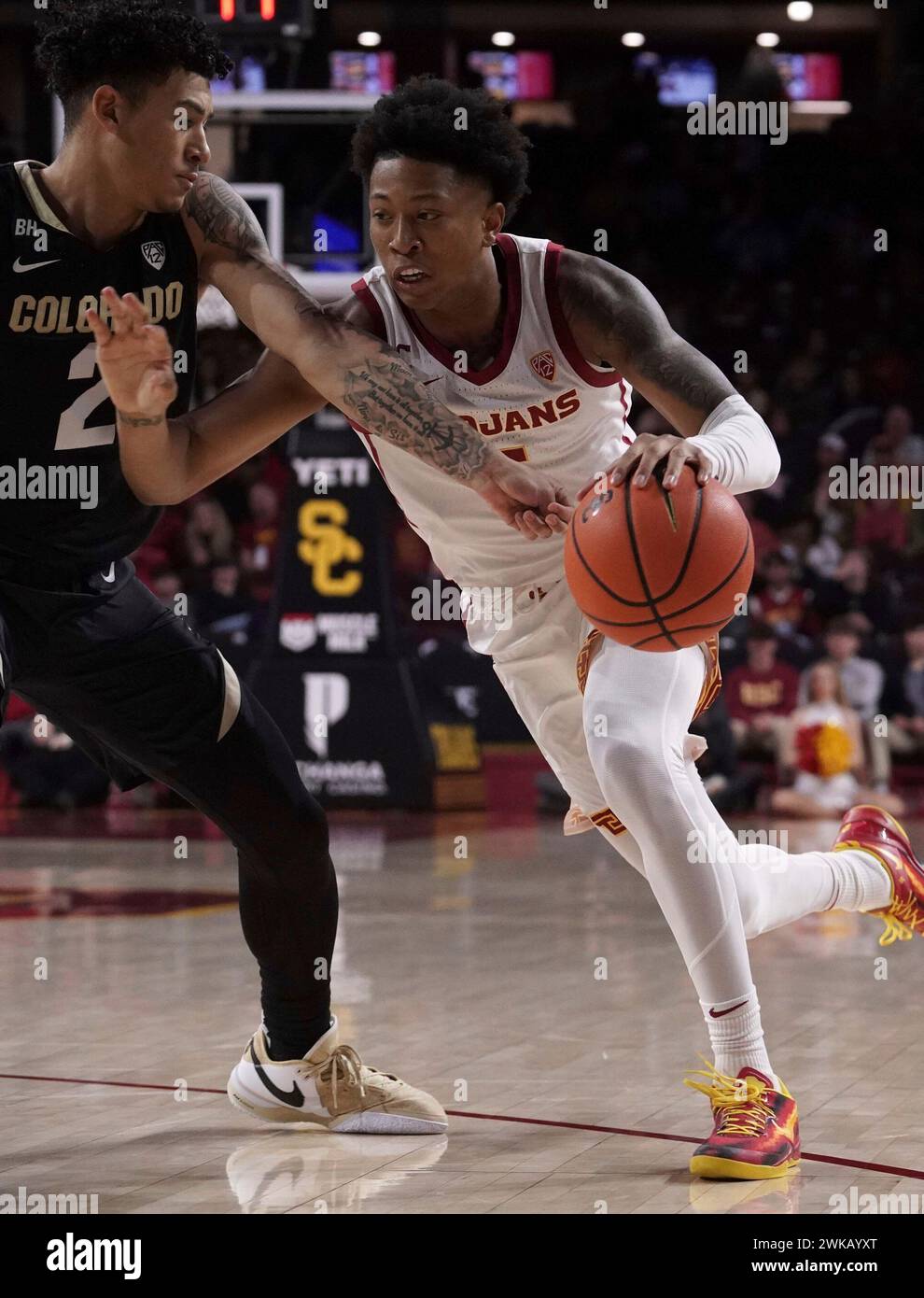 USC Trojans guard Boogie Ellis (5) makes a move with the basketball