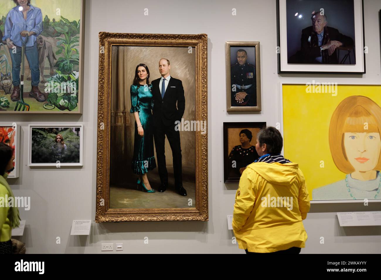 National Portrait Gallery London UK - visitors look at a portrait of The Duke and Duchess of Cambridge by artist Jamie Coreth painted in 2022 Stock Photo