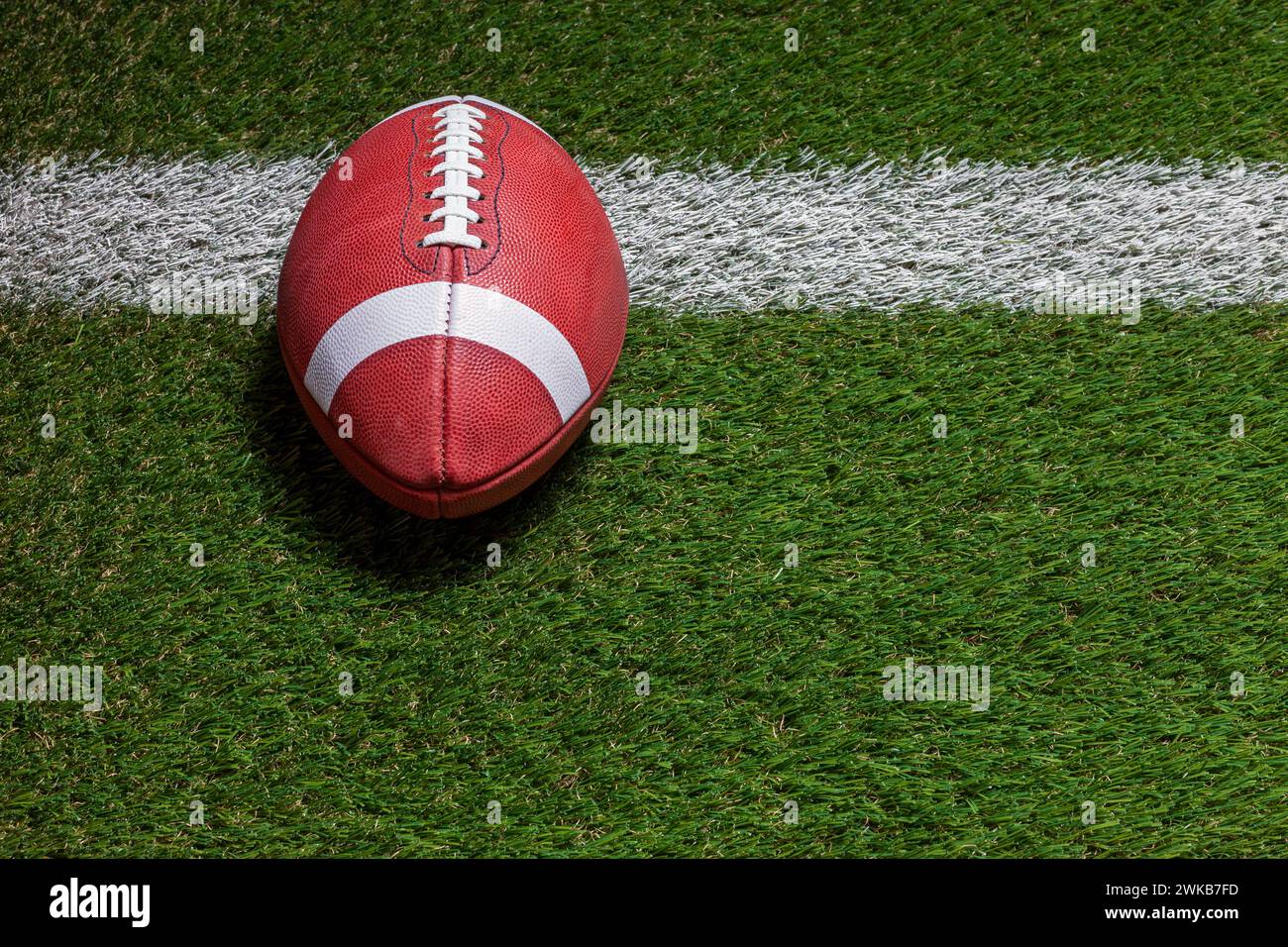 Football at the goal line on a grass field high angle view Stock Photo