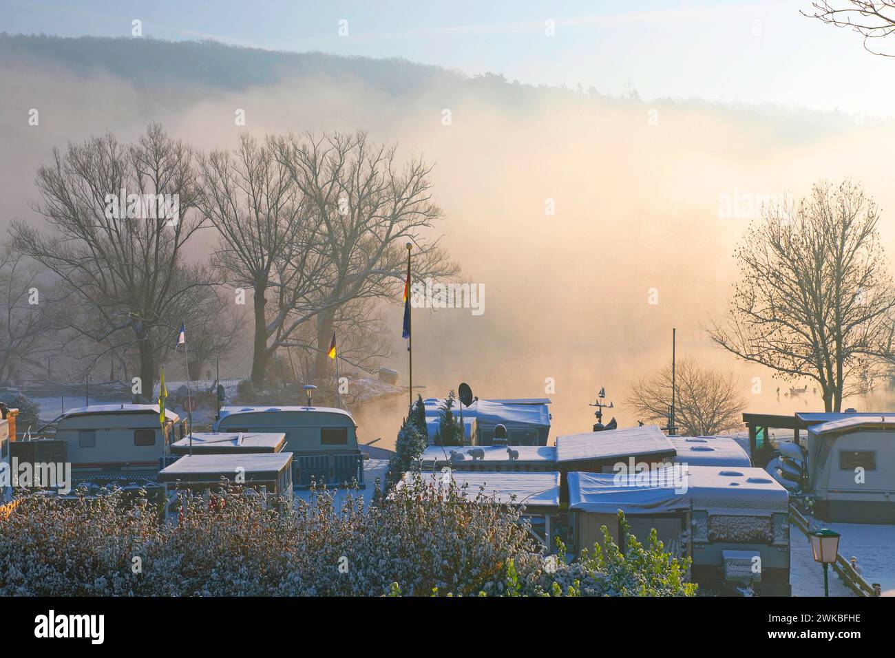 campsite on the Ruhr in winter with snow and fog in the early morning, Germany, North Rhine-Westphalia, Ruhr Area, Witten Stock Photo