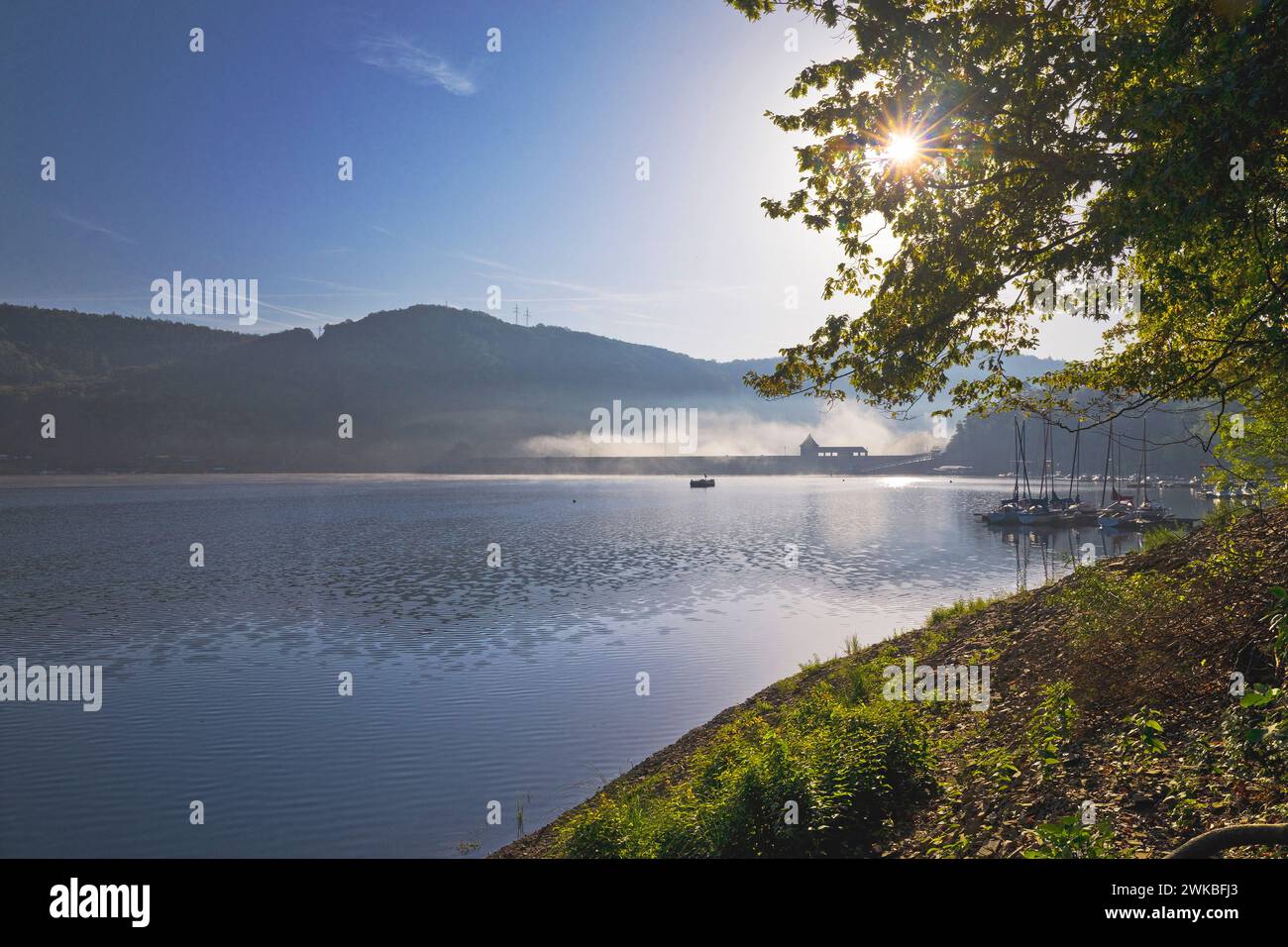 Eder dam with the dam wall in morning light, Germany, Hesse, Edertal Stock Photo
