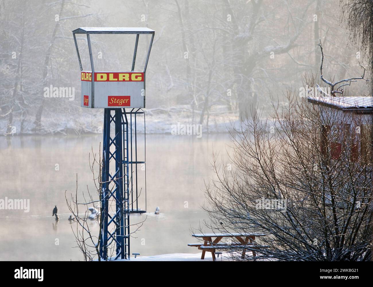 DLRG tower at the Steger campsite in winter with snow and fog over the Ruhr, Germany, North Rhine-Westphalia, Ruhr Area, Witten Stock Photo