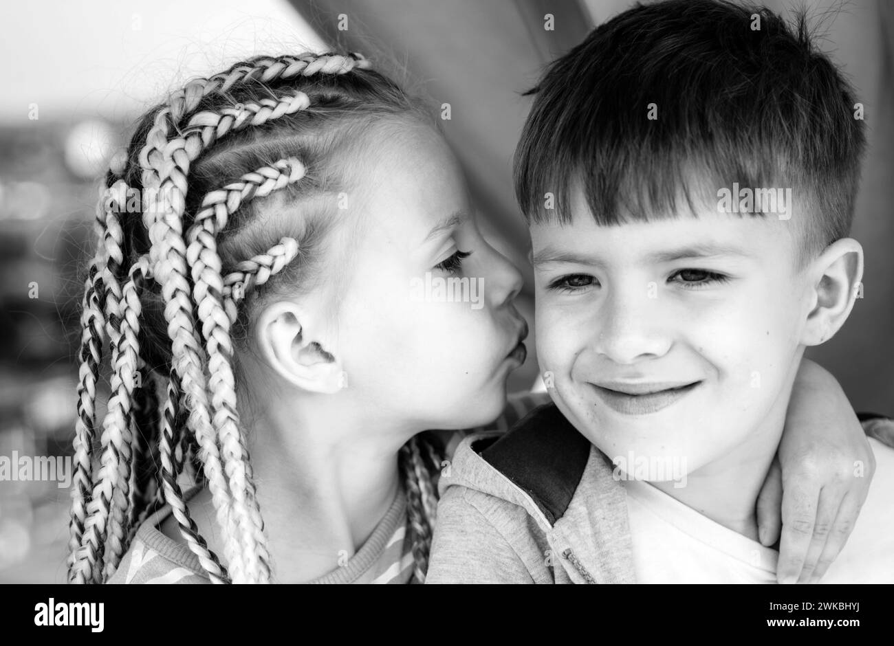 Sweet romantic. Kids little couple. Cute love. Little girl kissing boy